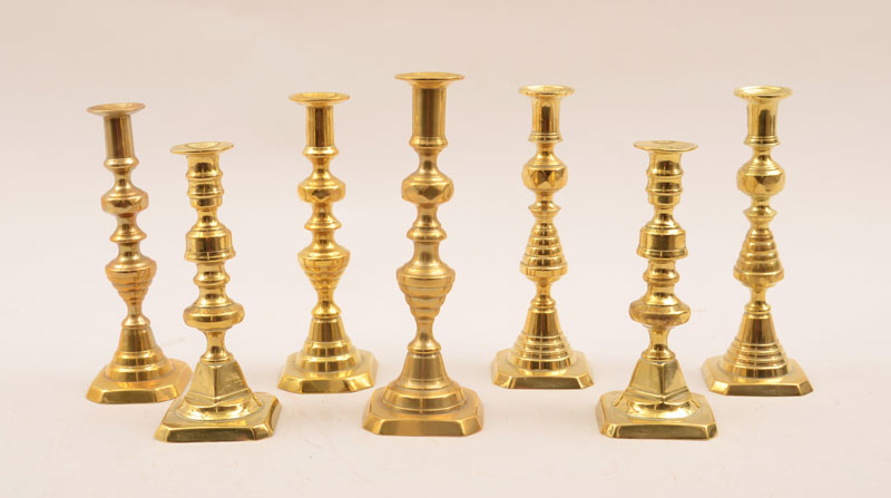 Appraisal: Three Pairs of English Brass Table Candlesticks and a Single