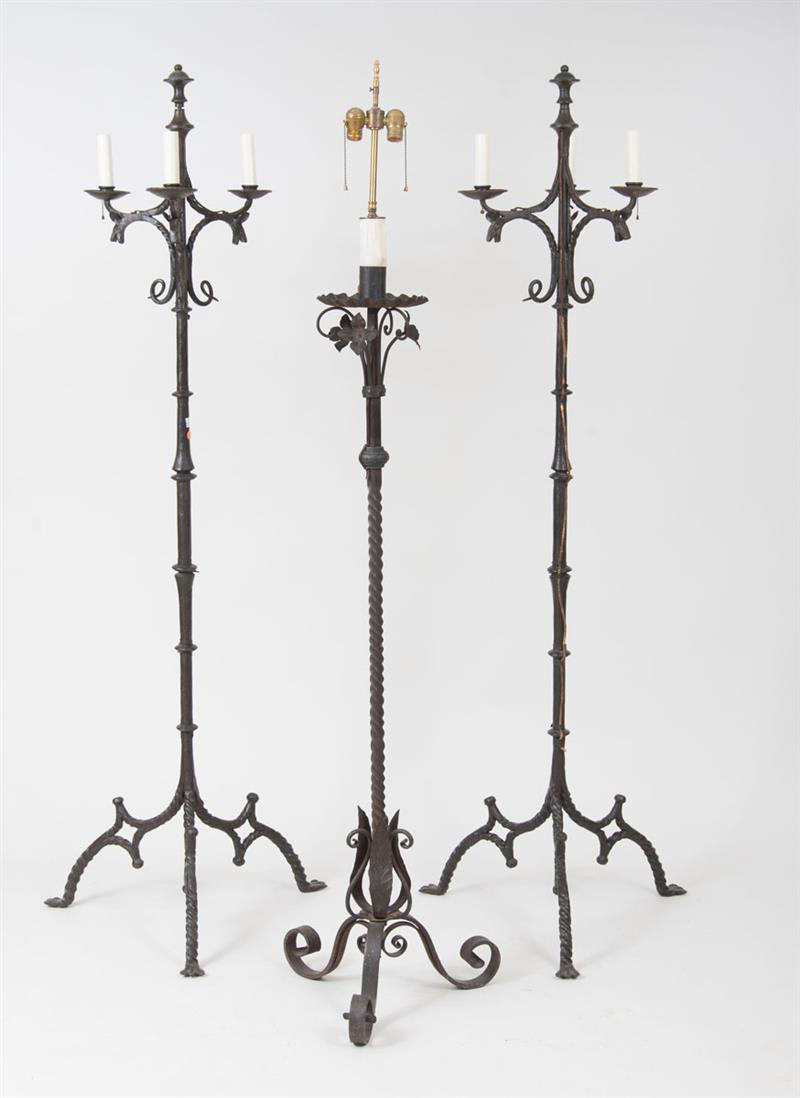 Appraisal: Pair of Wrought-Iron Torch res Together with another wrought-iron torch