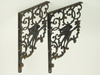 Appraisal: SHELF BRACKETS - Pair of large cast iron shelf brackets