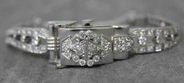 Appraisal: Lucien Piccard Ladies Diamond Platinum Watch Marked on clasp ''