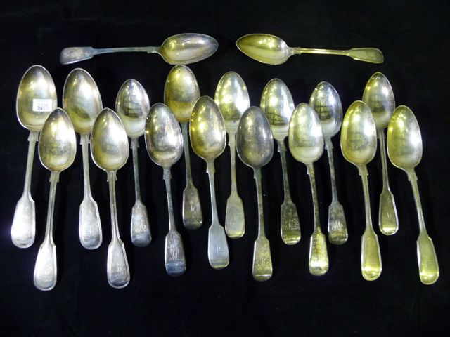 Appraisal: A set of eighteen large silver plate serving spoons each