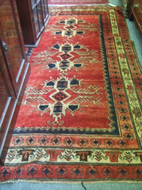 Appraisal: A North West Persian rug the rose field with three