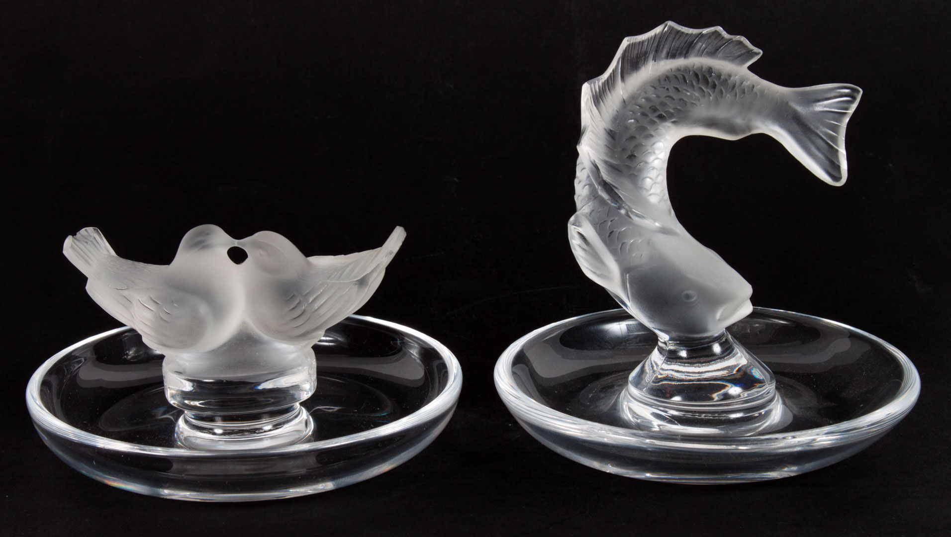 Appraisal: Two Lalique crystal figural ring holders each with circular base