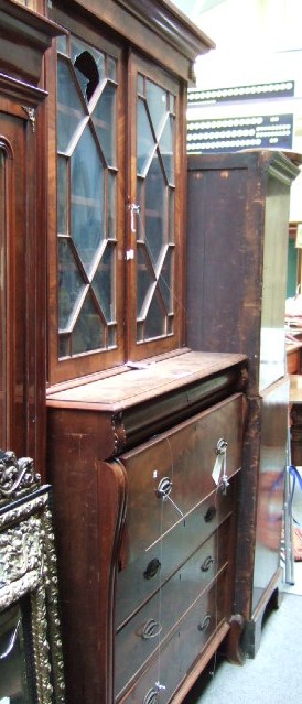 Appraisal: An early Victorian mahogany secretaire bookcase possibly North Country the