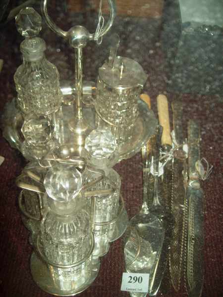 Appraisal: SIX SILVER PLATED KNIVES AND CAKE LIFTERS PLUS TWO CRUET