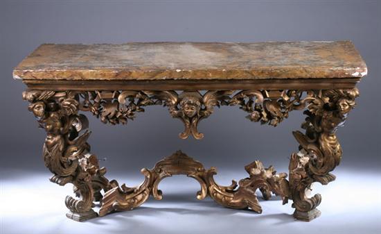 Appraisal: ITALIAN BAROQUE CARVED AND GILT-WOOD MARBLE-TOP PALACE CONSOLE TABLE Rectangular