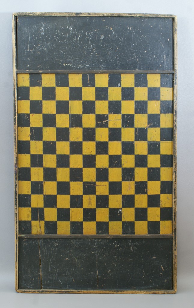 Appraisal: Painted pine game board yellow and black checkerboard design x