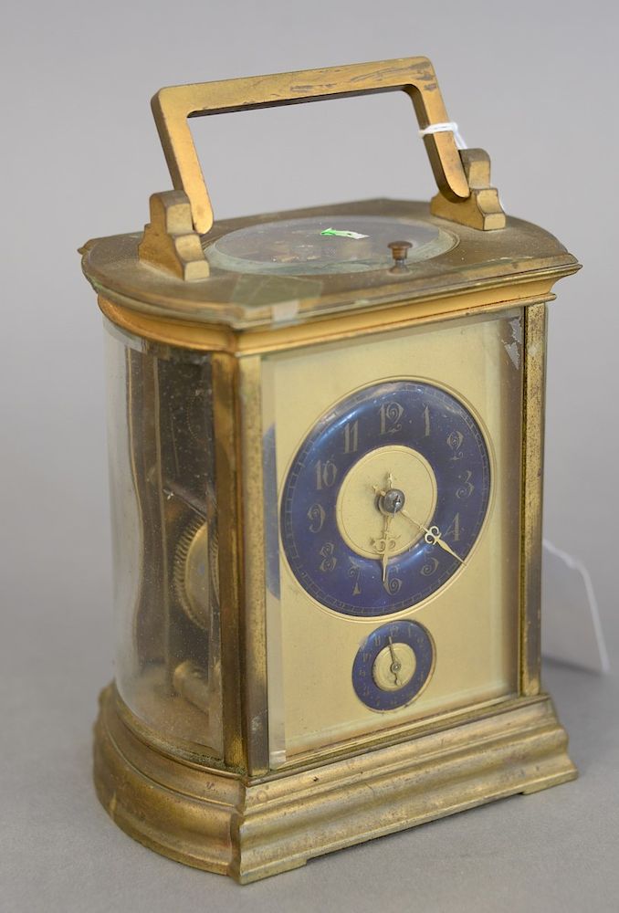 Appraisal: French brass and glass carriage clock having blue enameled king