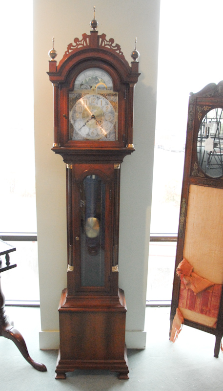 Appraisal: A Dwarf Tall Case Clock by Colonial having a fruitwood