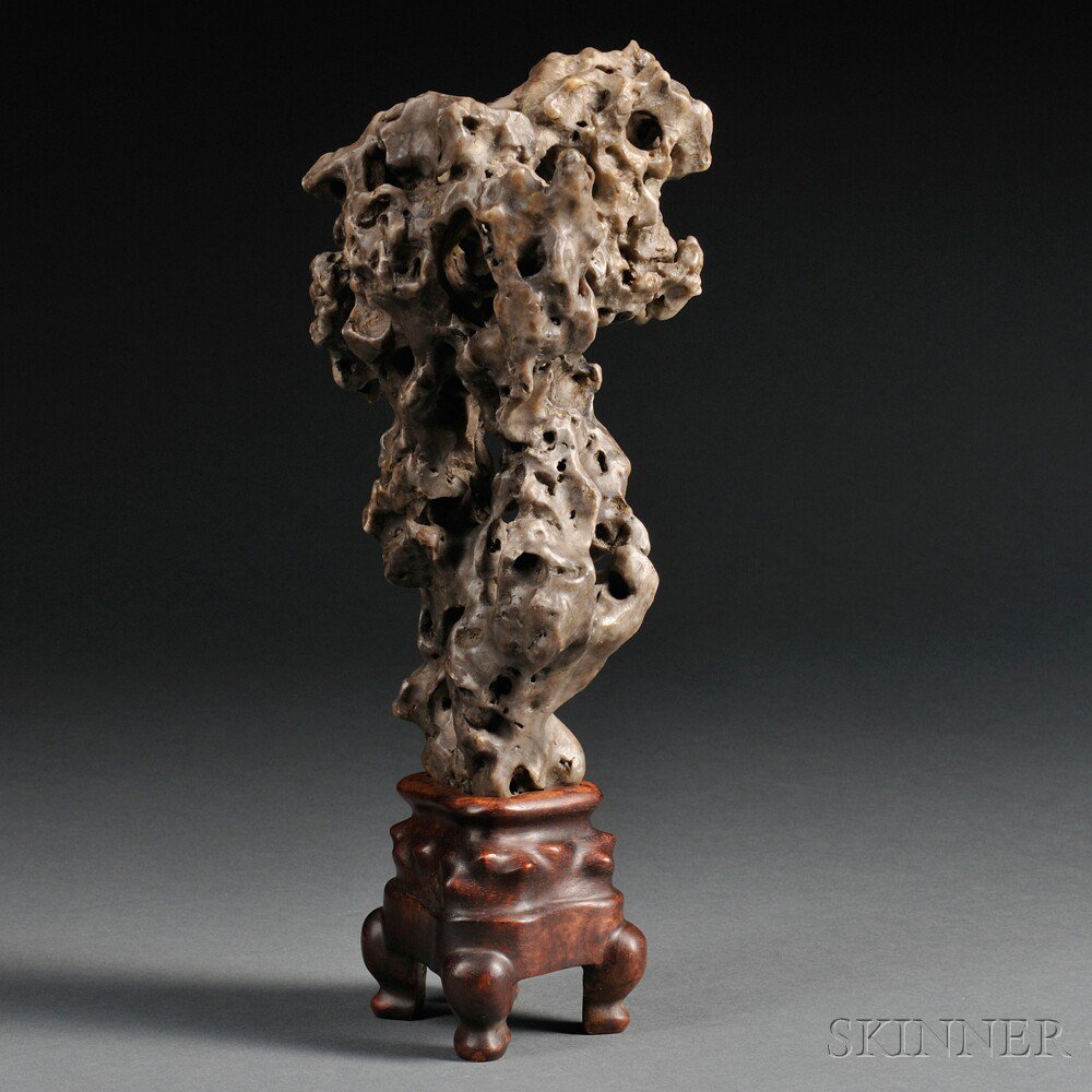 Appraisal: Scholar's Rock on Wood Stand China of tapering form with