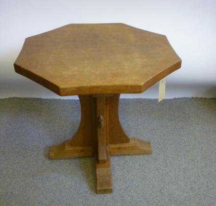 Appraisal: AN ADZED OAK OCCASIONAL TABLE by Robert Mouseman Thompson the