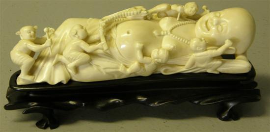 Appraisal: Chinese Ivory figure of a buddha with various figures scrambling