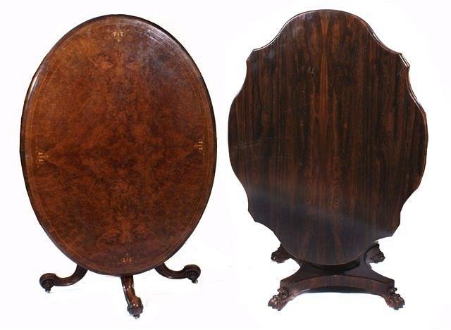 Appraisal: A VICTORIAN FIGURED WALNUT DINING TABLE with stylised marquetry decoration