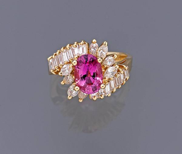 Appraisal: A pink sapphire and diamond ring estimated total diamond weight