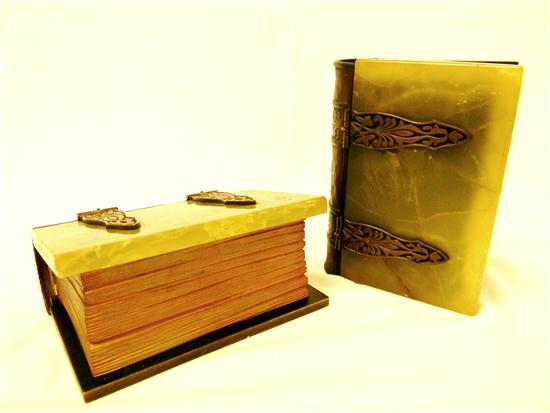 Appraisal: Pair of bronze and green marble bookends book form one