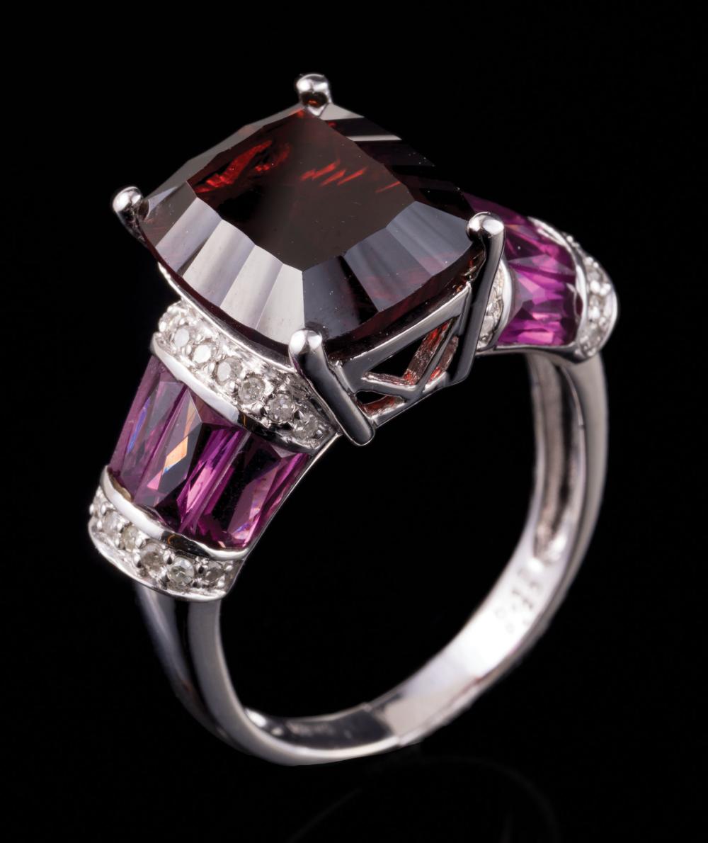 Appraisal: kt White Gold Garnet and Diamond Ring center prong set