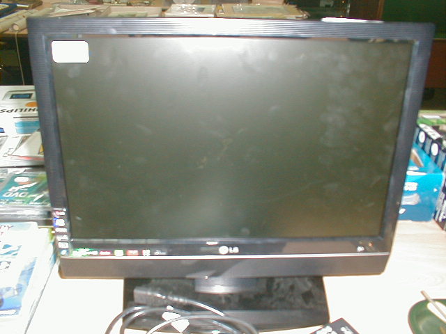 Appraisal: An LG flat screen television with remote control