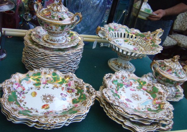 Appraisal: An English porcelain dessert service possibly Coalport white green and