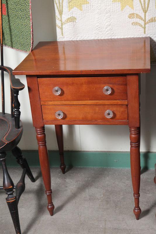 Appraisal: TWO DRAWER STAND Cherry with an overlapping top glass pulls