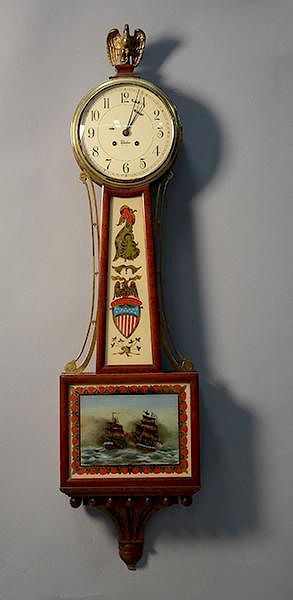 Appraisal: Chelsea banjo clock with reverse painted tablets of USS Constitution