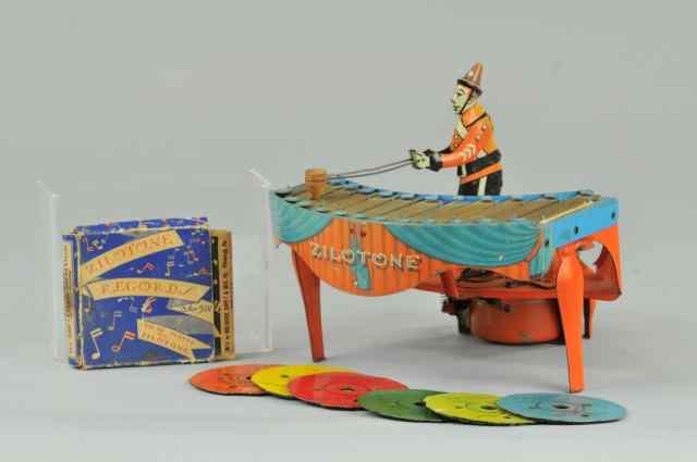 Appraisal: ZILOTONE Wolverine Mfg tin and pressed steel musical toy depicts