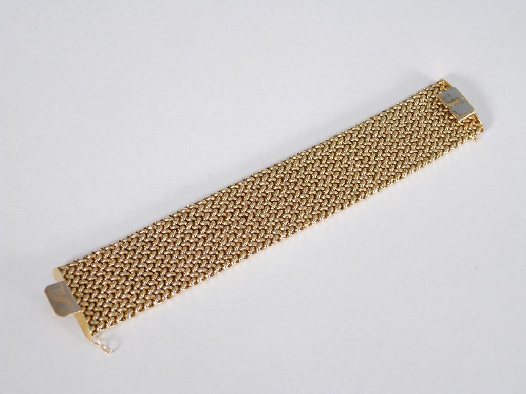 Appraisal: A modern ct gold wide Bracelet with textured links London