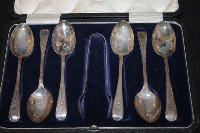 Appraisal: A CASED SET OF SIX SILVER TEASPOONS and sugar tongs