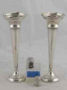 Appraisal: A pair of silver specimen vases Birmingham together with two