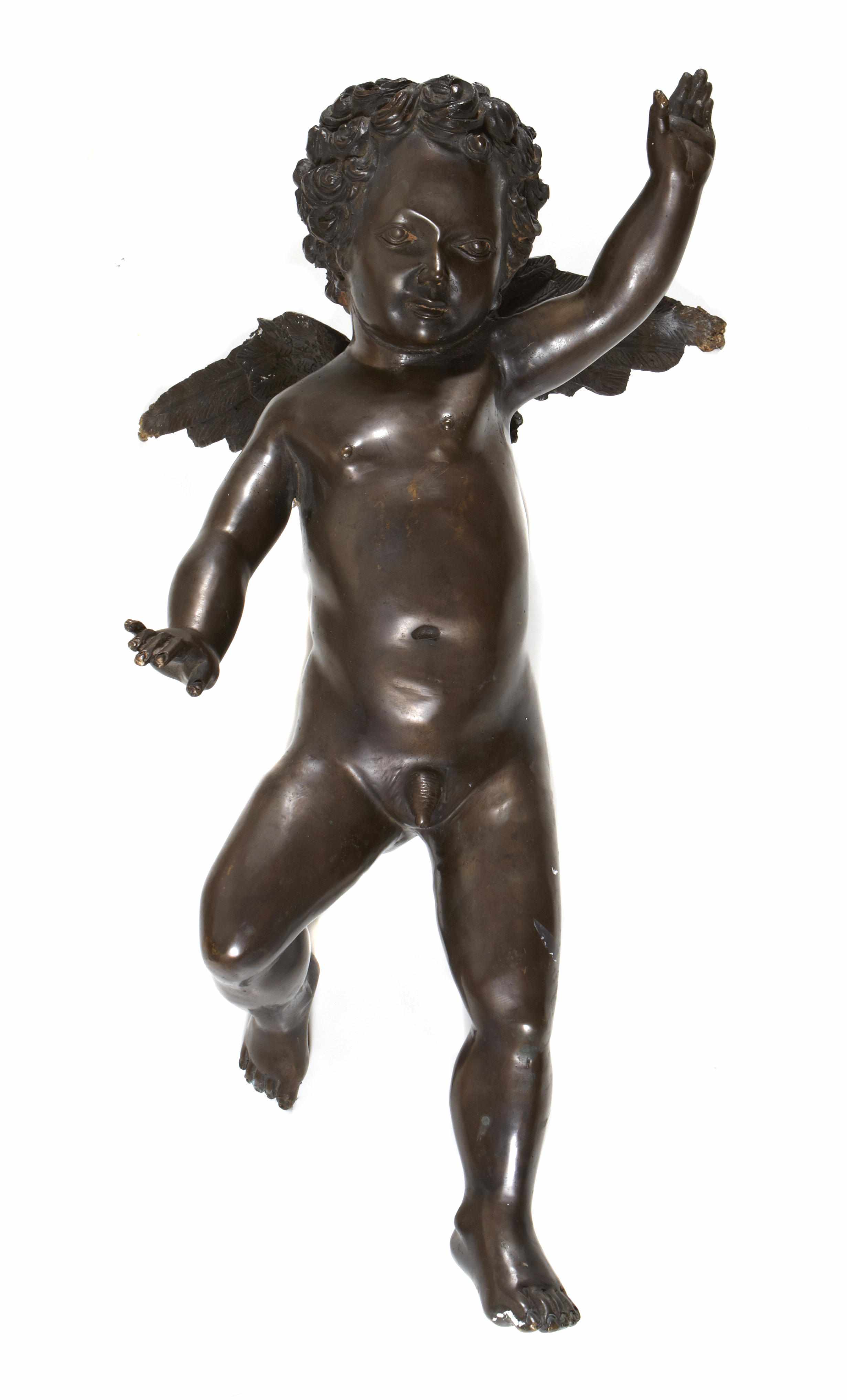 Appraisal: A Continental Baroque style cast bronze figure of a cherub