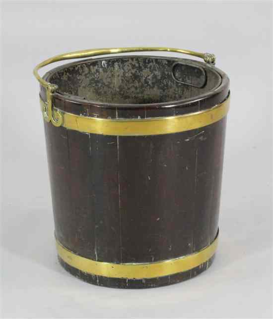 Appraisal: A George III brass bound mahogany peat bucket with swing