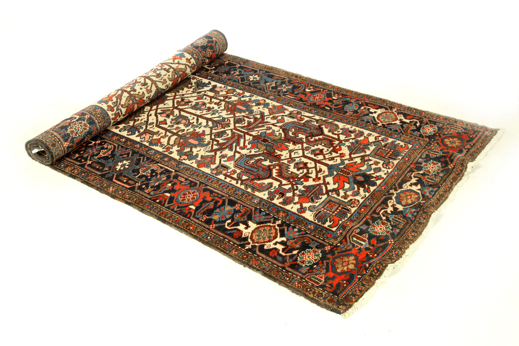 Appraisal: ORIENTAL RUG Heriz Ivory ground and wide blue border '