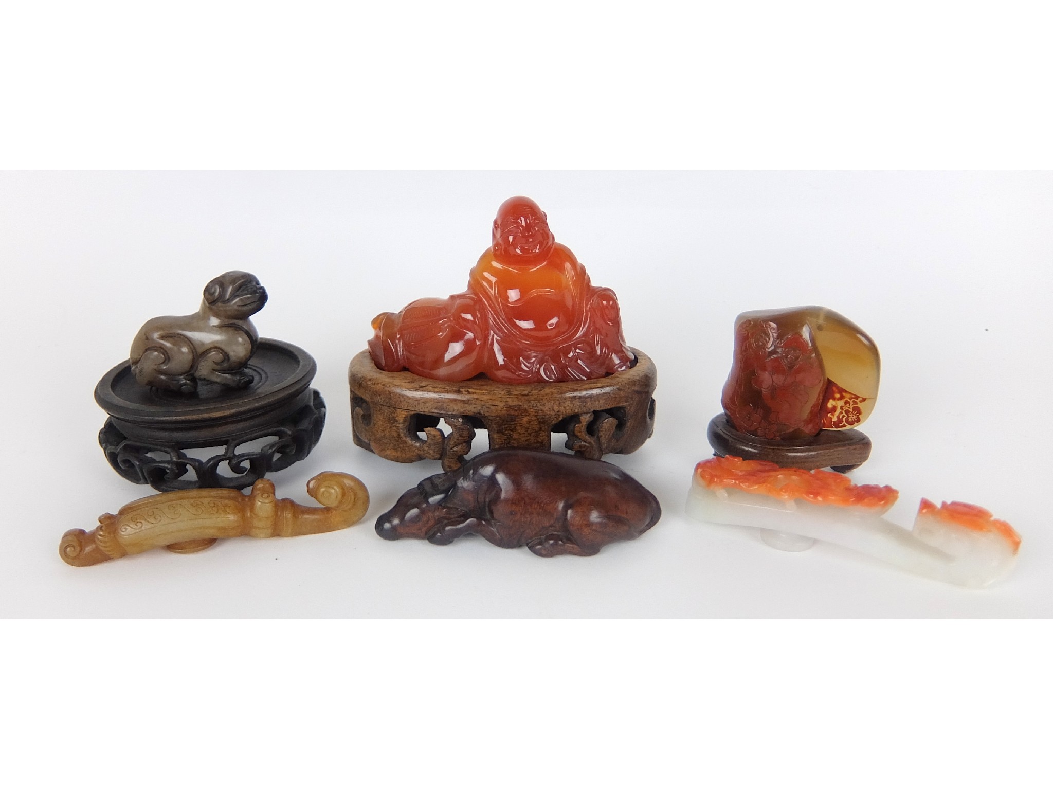 Appraisal: A Chinese agate carved figure of a Buddha cm high