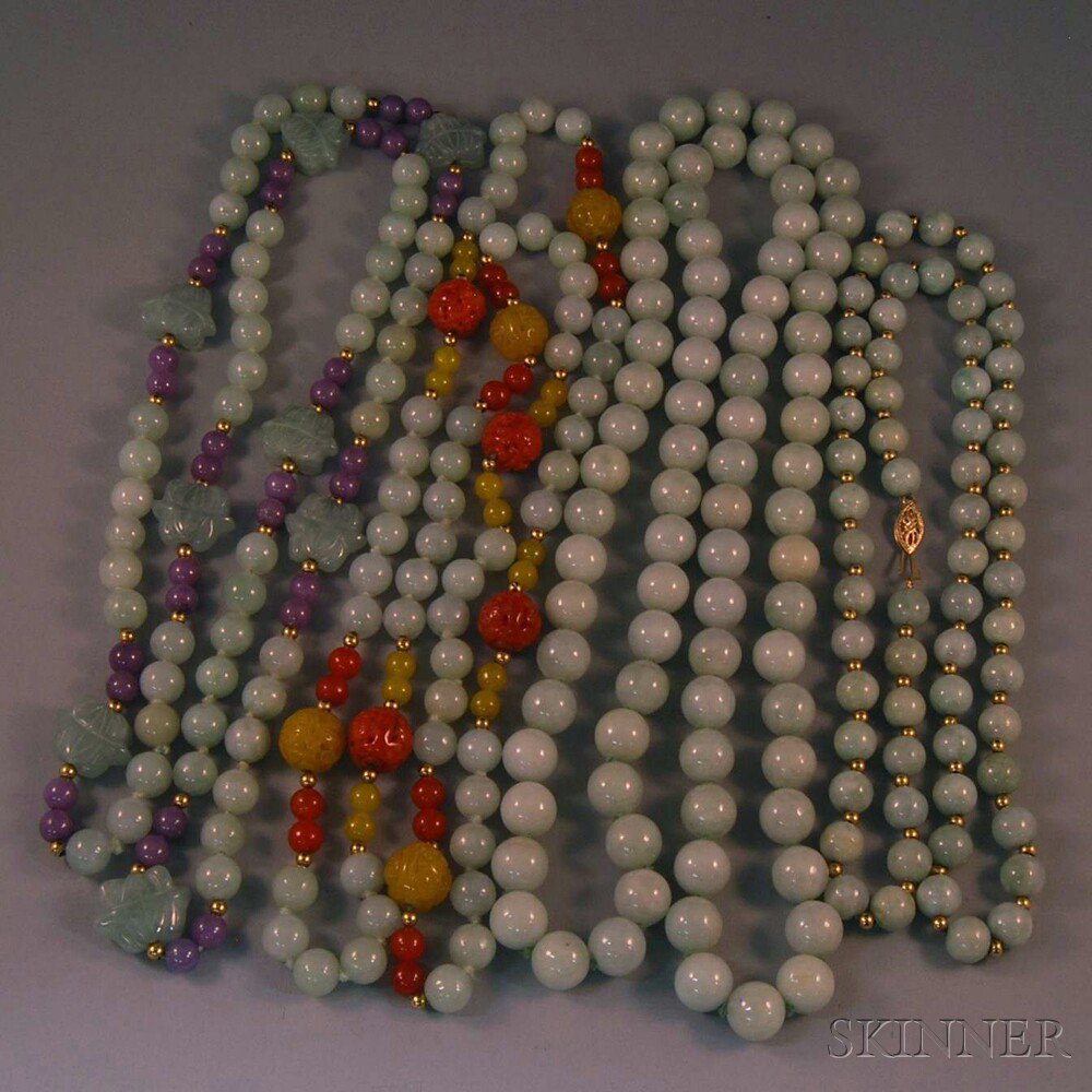 Appraisal: Four Jade Bead Necklaces three with gold beads one accented