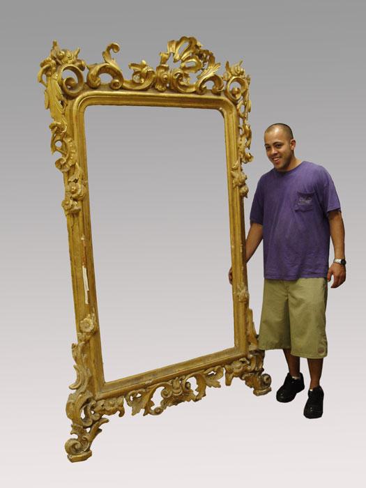 Appraisal: GOLD GILT MIRROR WITH ROCOCO CARVED CREST Approx '' x