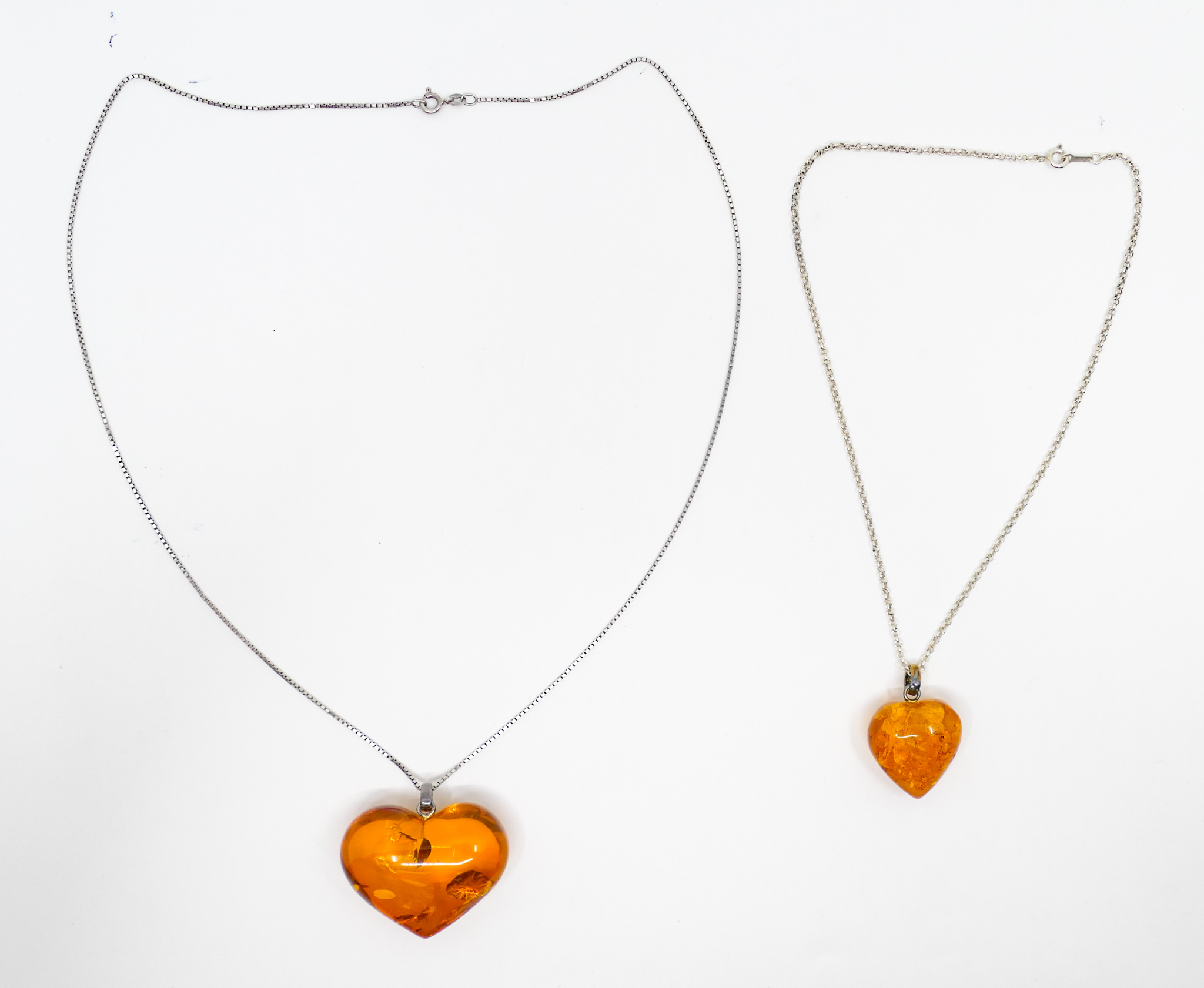 Appraisal: pc Natural Amber Heart Pendants '' to '' - Grams