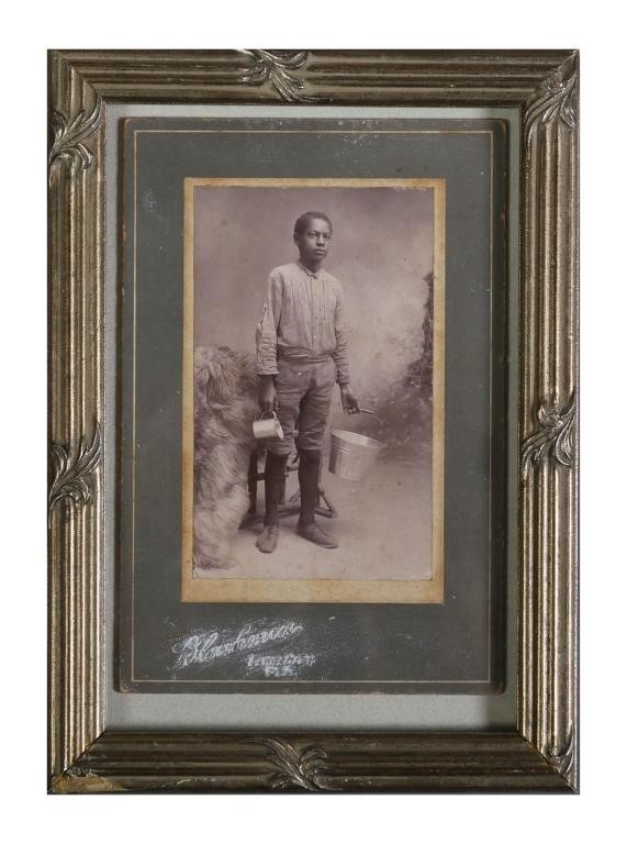 Appraisal: CABINET PHOTOGRAPH YOUNG AFRICAN AMERICAN BOYA cabinet photograph of a