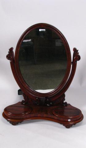 Appraisal: Early Victorian oval dresser top shaving mirror with C scroll