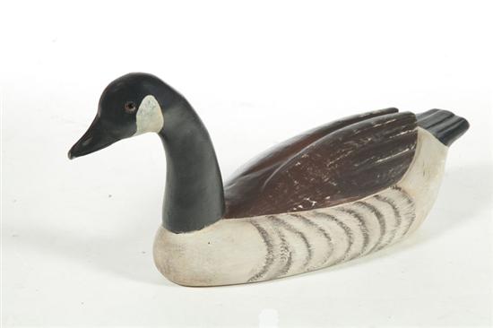 Appraisal: CARVED CANADA GOOSE American mid th century wood Life-size goose