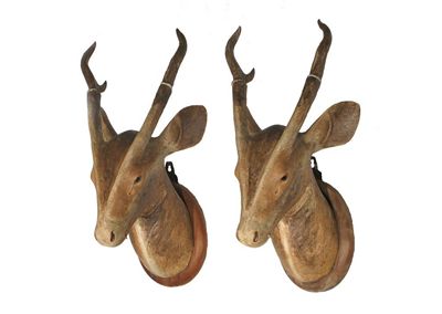 Appraisal: A pair of Chinese porcelain stags' heads each with detachable