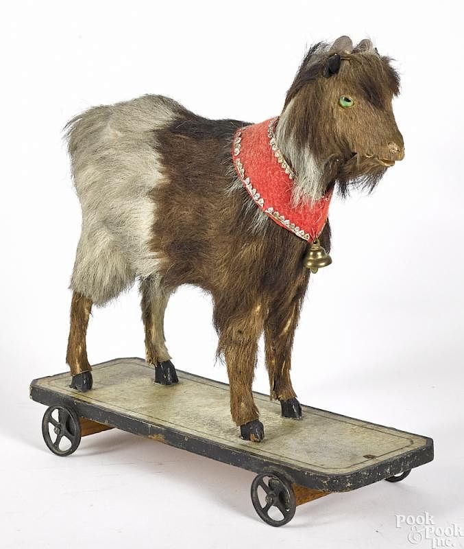 Appraisal: Goat on platform pull toy Goat on platform pull toy