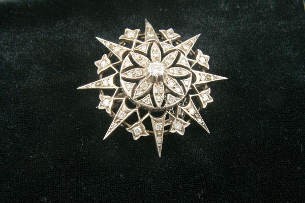 Appraisal: A th Century Diamond Star Brooch with large central circular-cut