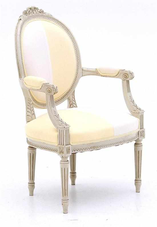 Appraisal: Louis XV style carved and painted bergere shaped oval padded