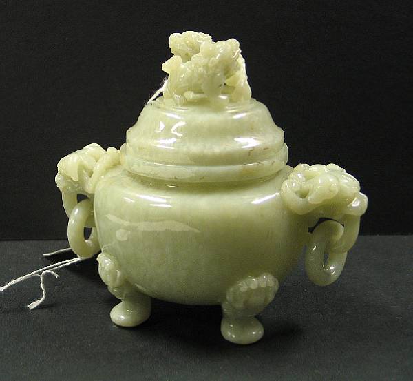 Appraisal: A pale green hardstone covered tripod censer The feet and