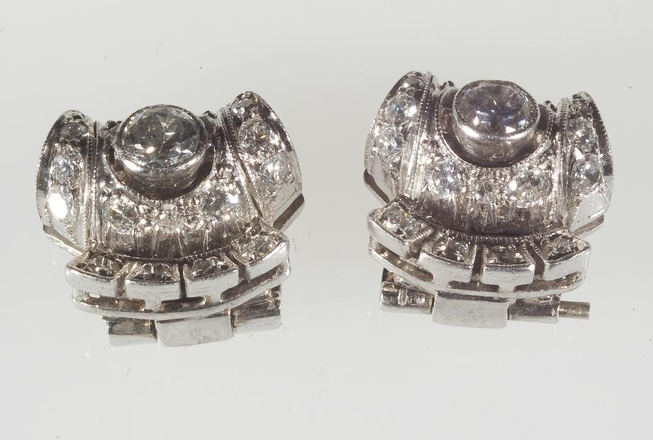 Appraisal: PAIR OF DIAMOND EARCLIPS c of volute design set throughout