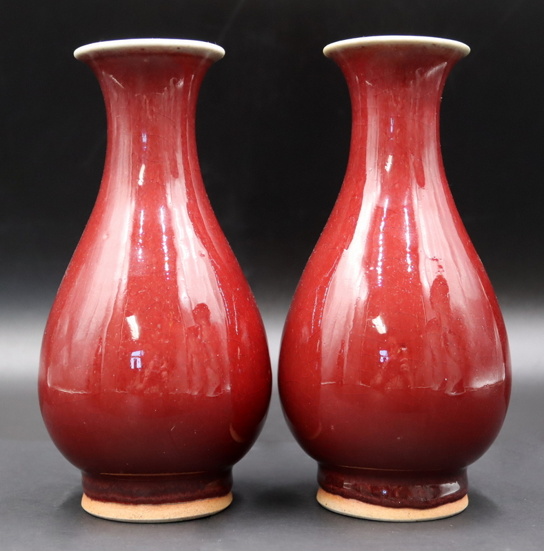 Appraisal: Pair of Chinese Sang de Beouf Vases From a Little