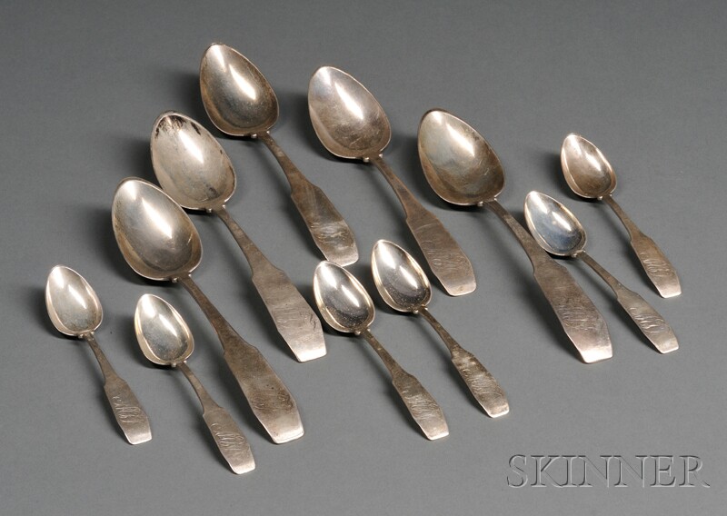 Appraisal: Eleven Coin Silver Spoons unknown maker with down-turned coffin-fiddle handles