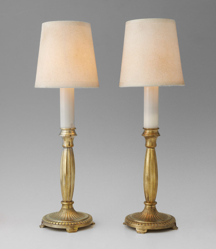 Appraisal: FRENCH GILDED CANDLE LAMPS Early 's gold-gilt bronze bases with