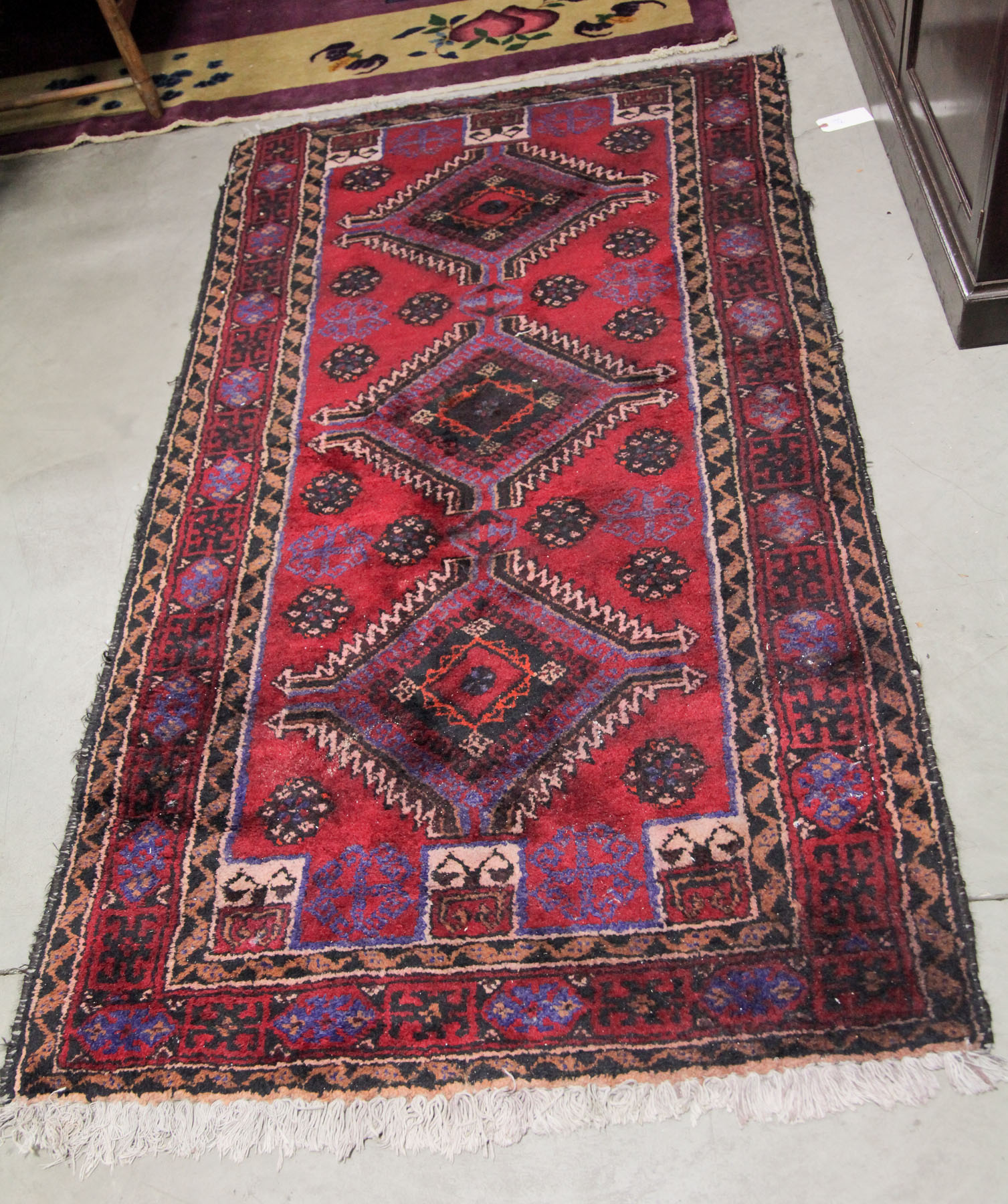 Appraisal: ORIENTAL RUNNER Iran th century wool on cotton foundation Red