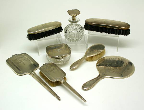 Appraisal: A group of sterling mounted lady's and gent's dressing accessories