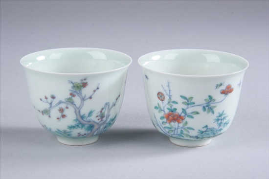 Appraisal: TWO CHINESE DOUCAI PORCELAIN MONTH CUPS Kangxi six-character underglazed blue